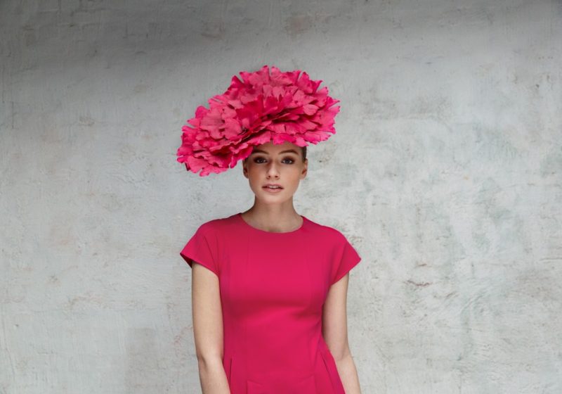 Couture hat with pink flower petals