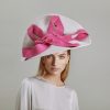 Uplifted hat in white and pink straw