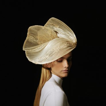 Couture hat called paradisier with soft lines in natural color